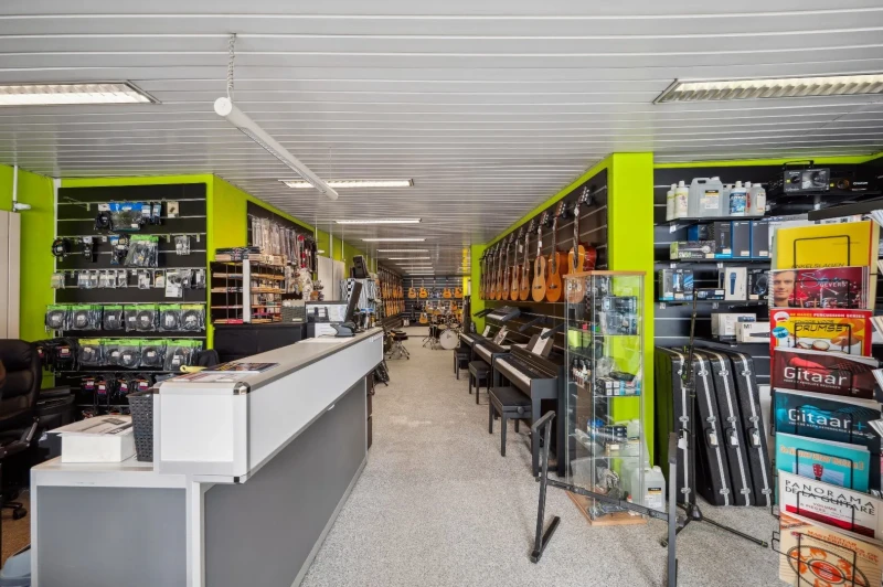 2 gekoppelde woningen met handelsruimte en woonst