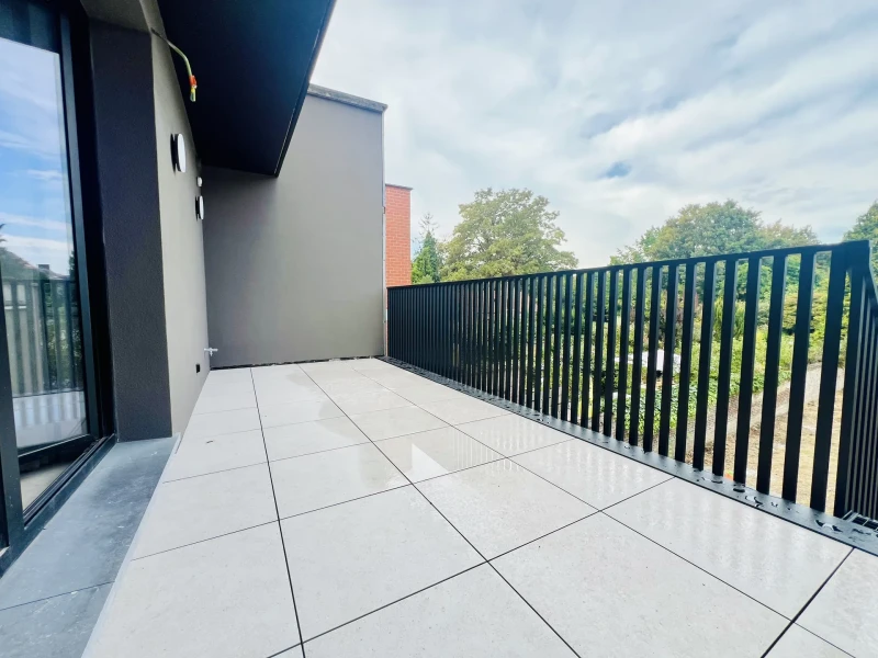 Exclusief villa-appartement met hoogstaande afwerking op toplocatie
