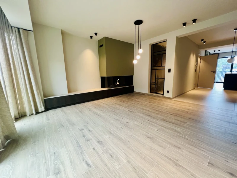 Exclusief villa-appartement met hoogstaande afwerking op toplocatie
