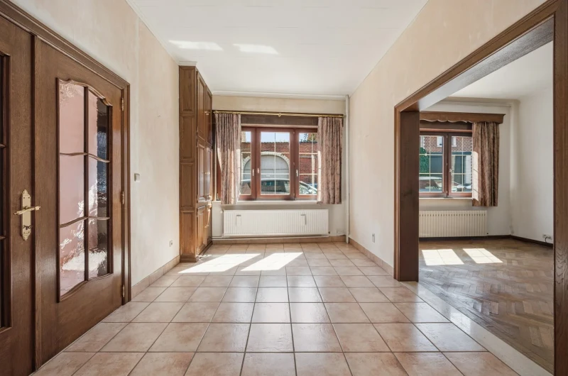 1 rijwoning en 2 appartementen in gezellig Hoegaarden