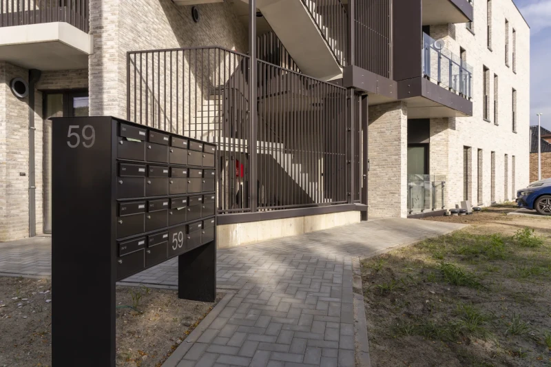 Nieuwbouwapp. met 2 slpks, terras en tuintje